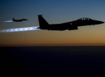 هواپیماهای F-15E نیروی هوایی آمریکا در بازگشت از حمله هوایی به سوریه در آسمان عراق (آژانس خبری اروپا)